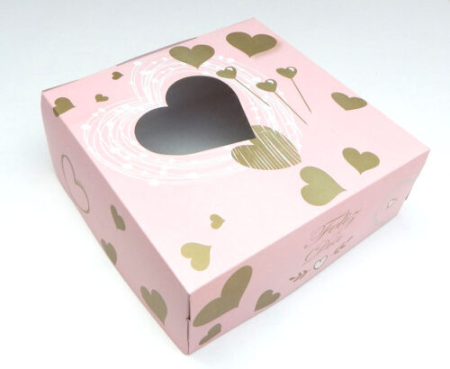 Caja 24x24x9 rosa c/visor corazón inclinado corazones dorados